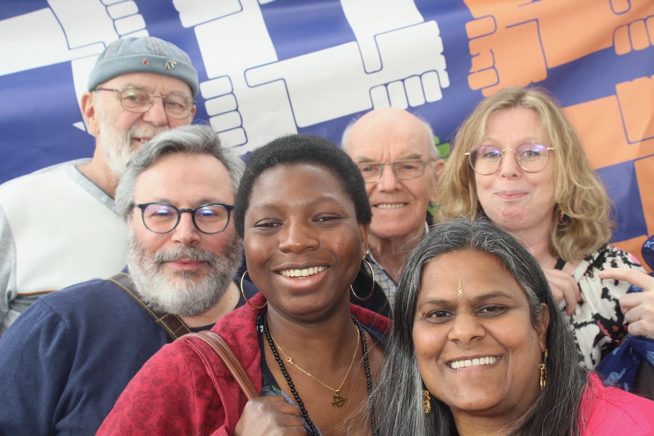 Photos de volontaires 11.11.11 à la Fête de la solidarité internationale à Bruxelles en 2024
