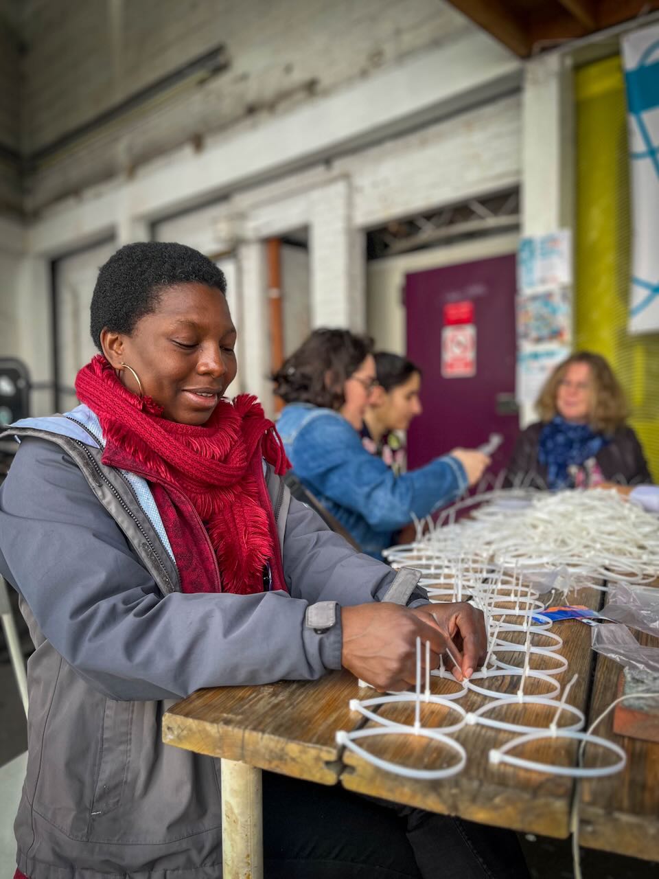 Labo Tchapo, bénévole 11.11.11, à la Fête de la solidarité internationale à Bruxelles en 2024.